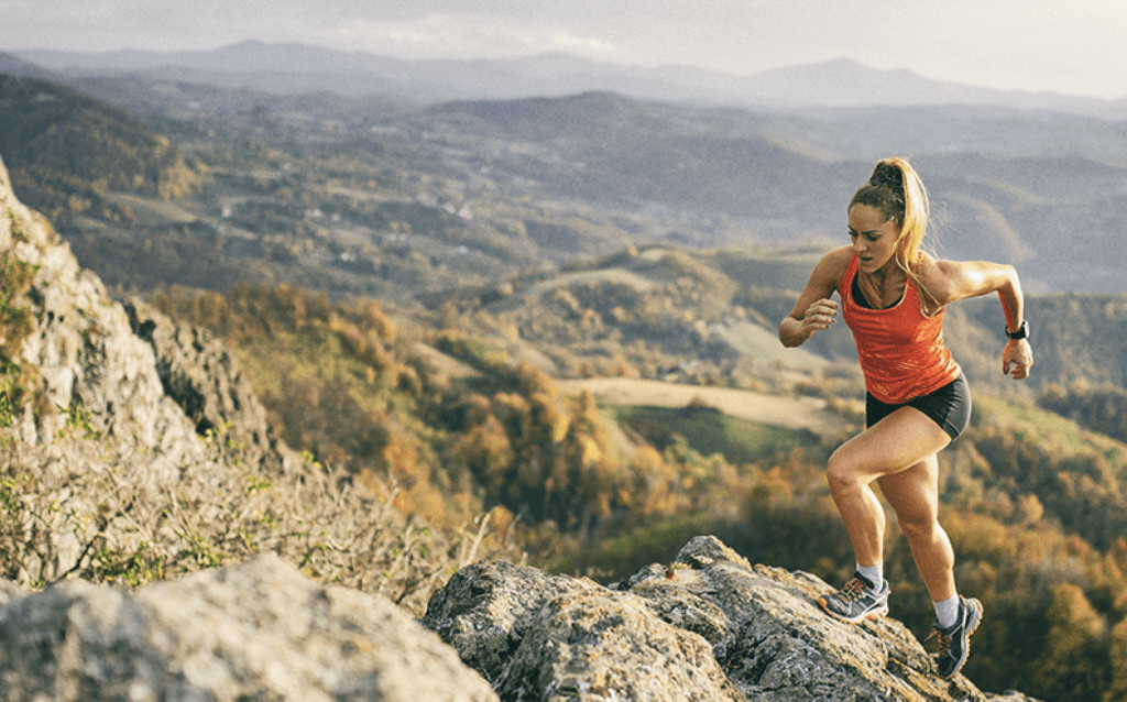 woman running in a mountain