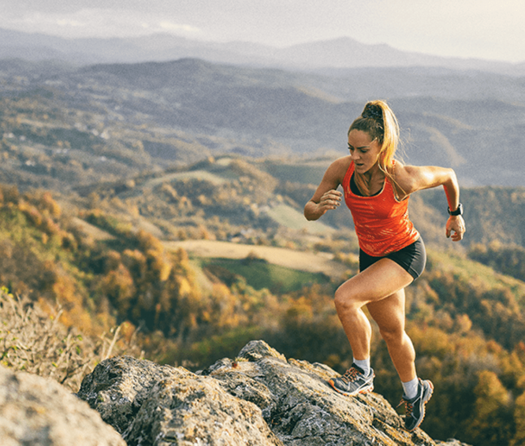 woman running in a mountain