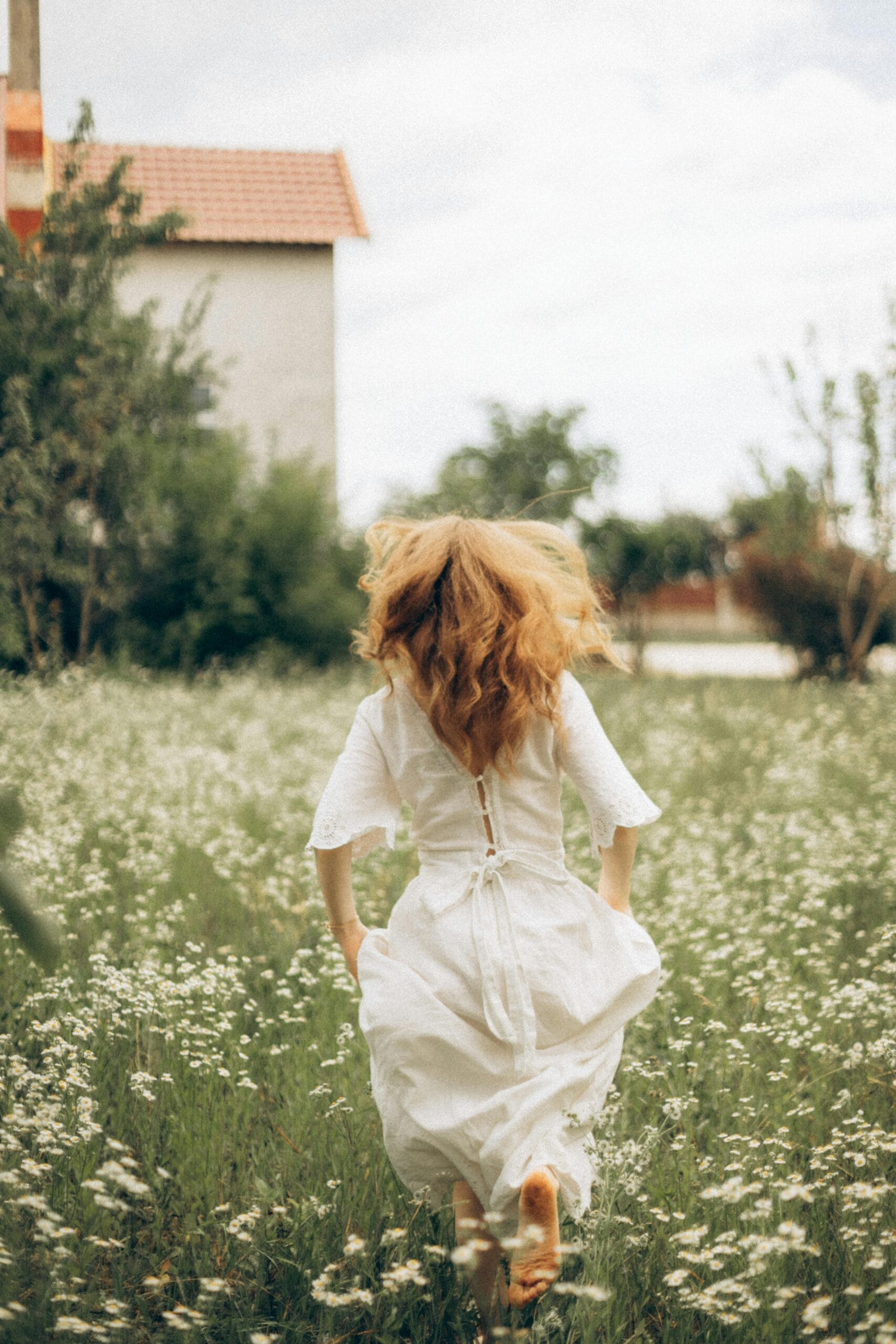 woman running and hair up in the wind